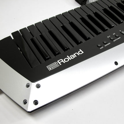 Roland AX-EDGE-B 49 Key Portable Keyboard Synthesizer Black Silver Keytar