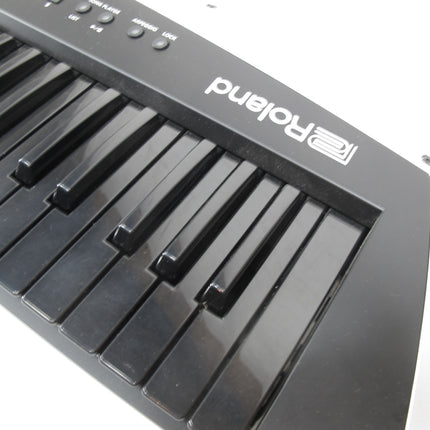 Roland AX-EDGE-B 49 Key Portable Keyboard Synthesizer Black Silver Keytar