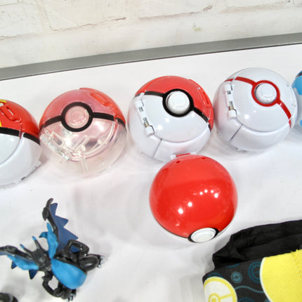 Collection of Pokemon 10 Pokeballs and 11 Figurines with Pouch
