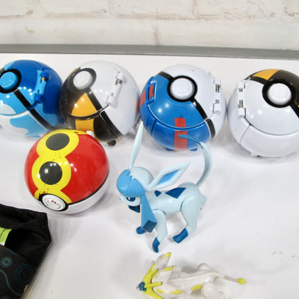 Collection of Pokemon 10 Pokeballs and 11 Figurines with Pouch