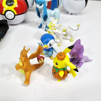 Collection of Pokemon 10 Pokeballs and 11 Figurines with Pouch